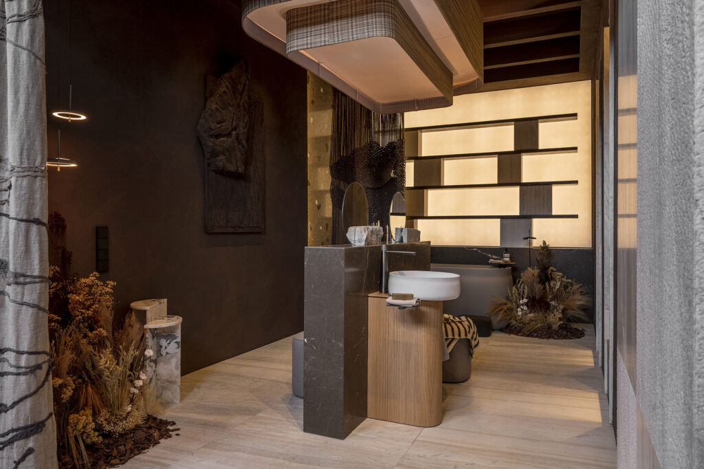 Palissandro marble cladding and an Armany Brown washbasin
