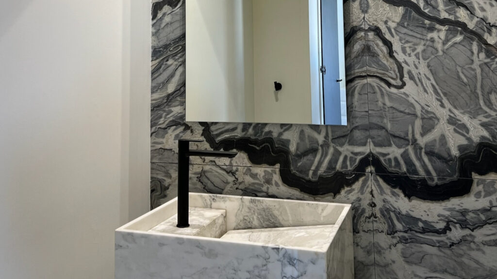 Calacatta marble washbasin with Silver Stream